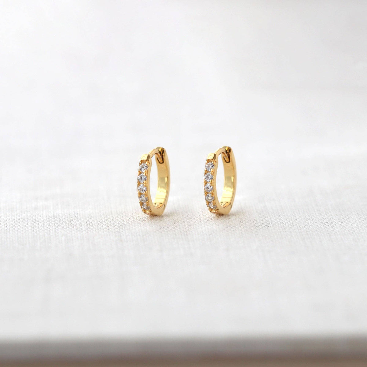Crystal Huggie Hoop Earrings: 18K Gold Vermeil / Crystal