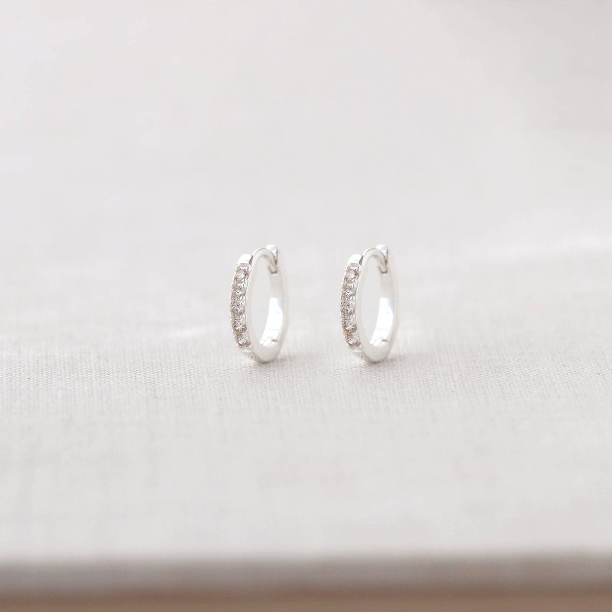 Crystal Huggie Hoop Earrings: 18K Gold Vermeil / Crystal