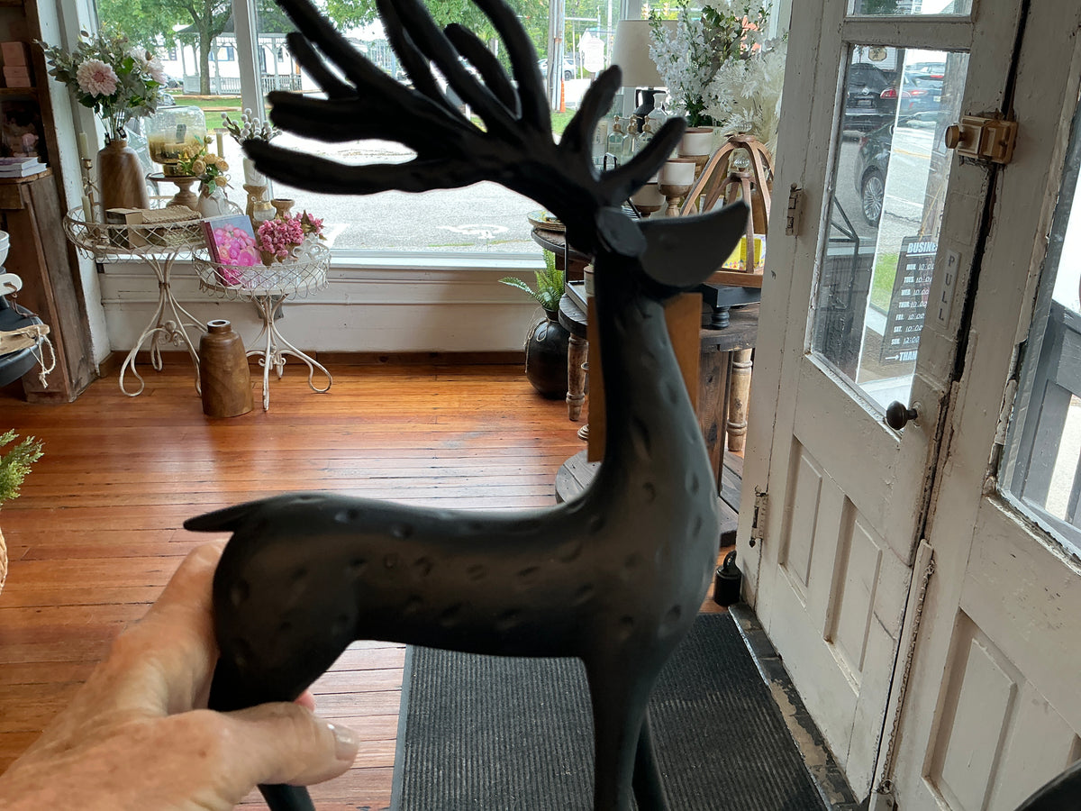 Resin deer black 7.5 long 2.5 wide12’ high