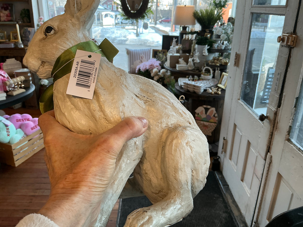 11.5” sitting white rabbit with green ribbon bow